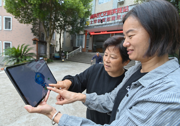 “抗瘤君AI”走进山村，为衢州开化的乡村居民带去肿瘤防治数字科普